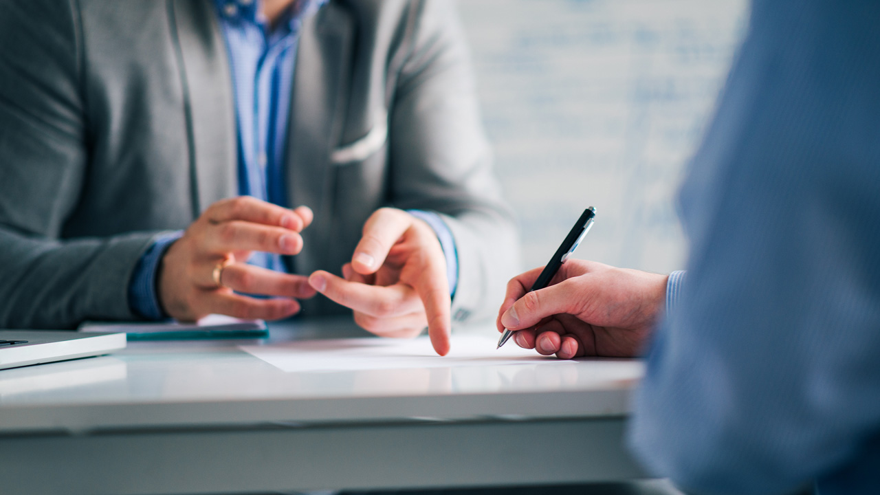 businessman leader presenting to work while meeting with colleagues in office